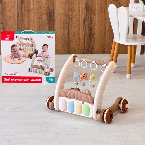 Каталка-игровой центр 2в1 с ковриком Baby Gym with Walker (бежевый) 1011 фото