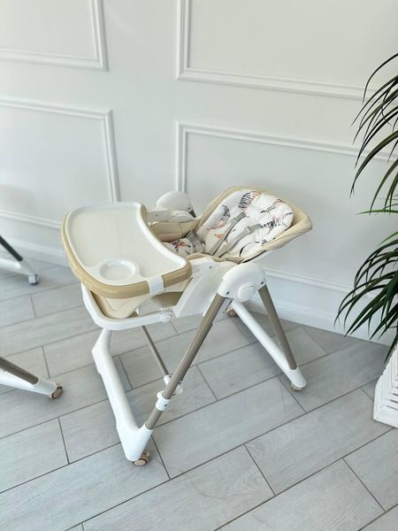 Стільчик для годування Bambi M 5897 з механічним заколисуючим механізмом (бежевий) M 5897 BG фото